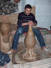 Shaping on a potter's kick wheel; Gülşehir, Turkey