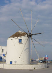 A fixed windmill typical of the Cyclades Islands